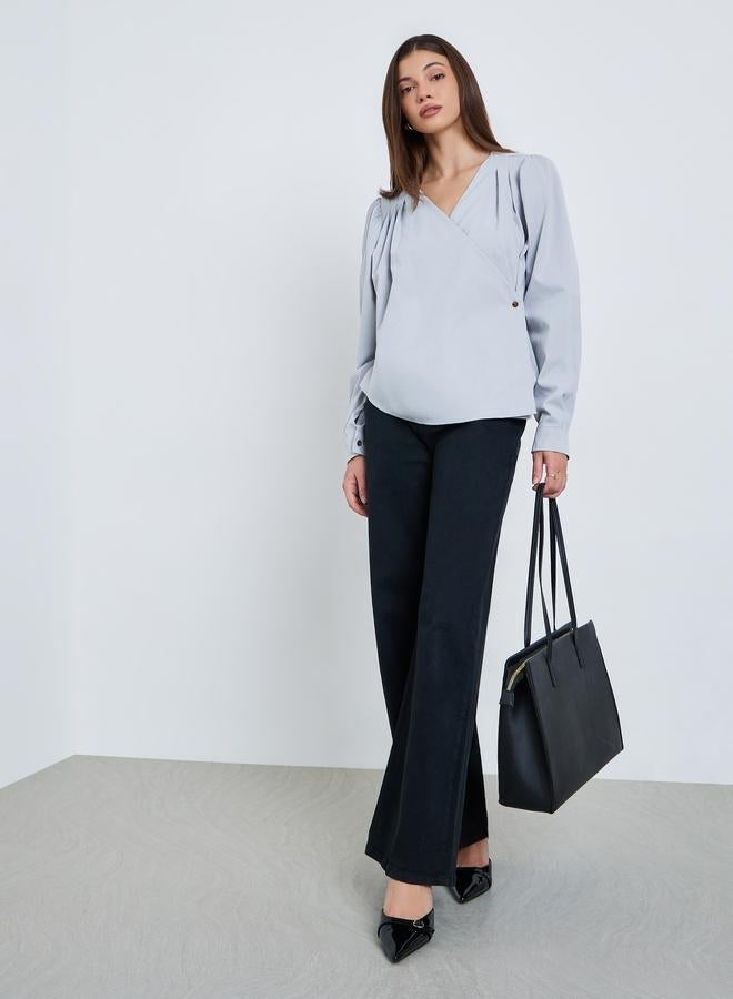 ستايلي بلوزة بنمط لف وأكمام بالون - Image 1